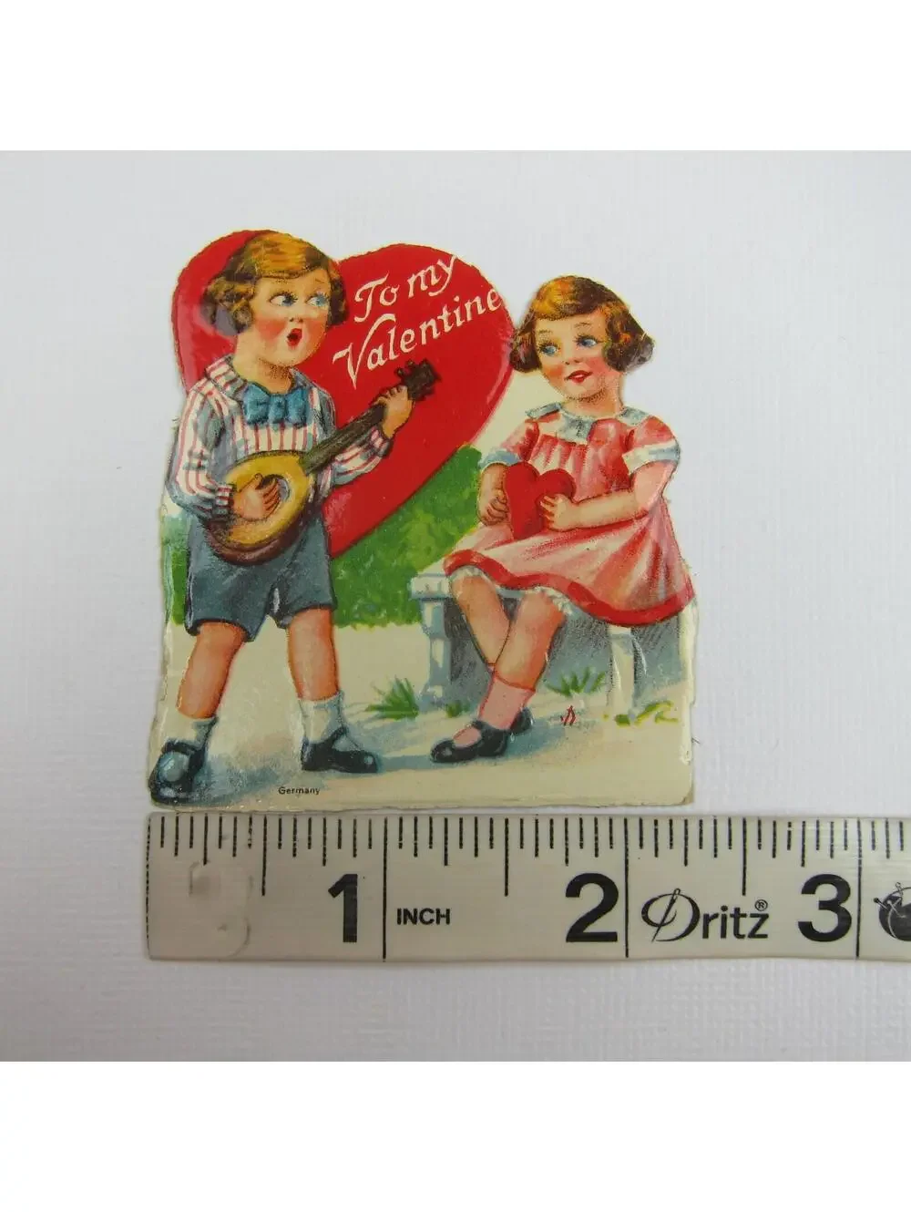 Vintage Valentine Die cut Boy Plays Mandolin for Girl Pink Dress Red Hearts